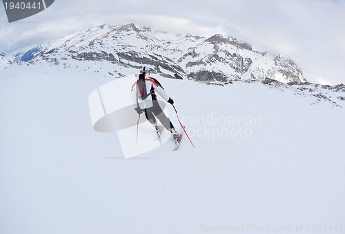 Image of skiing on fresh snow at winter season at beautiful sunny day