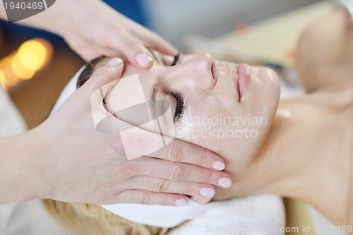 Image of Beautiful young woman in spa