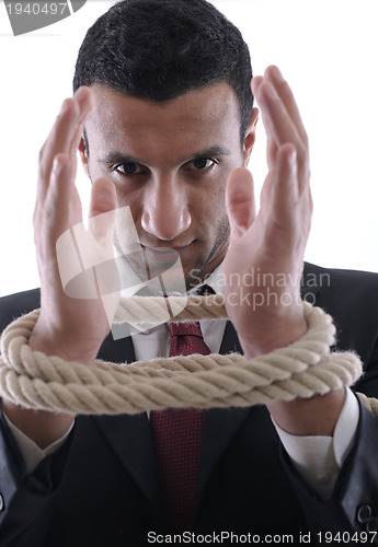 Image of business man with rope isolated on white background