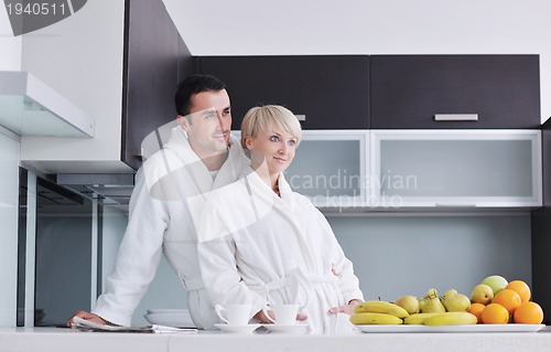 Image of young couple have fun in modern kitchen