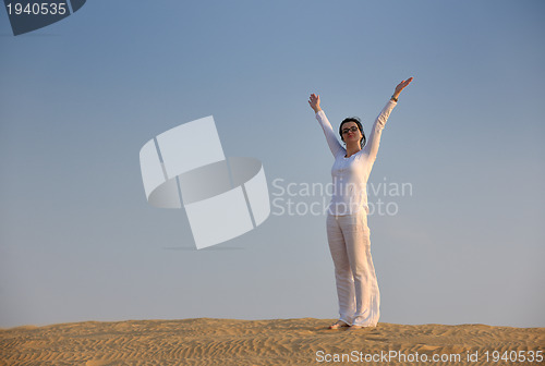 Image of woman relax in desert