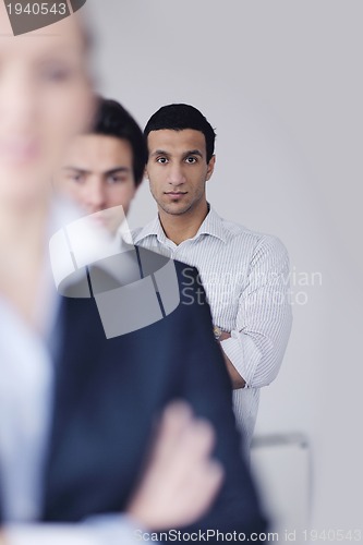 Image of young business man at meeting