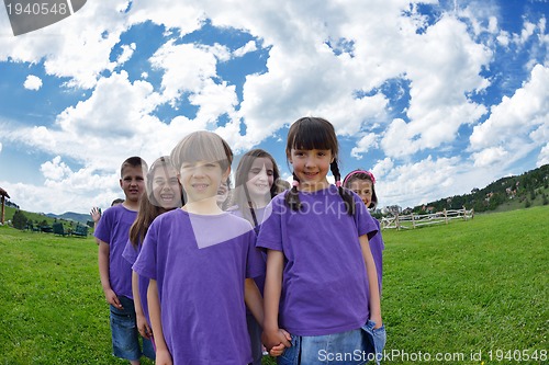 Image of happy kids group  have fun in nature