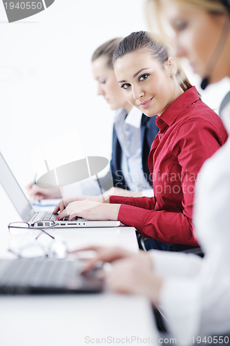 Image of business woman group with headphones