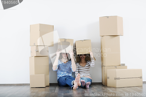 Image of Young couple moving in new house