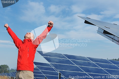 Image of Male solar panel engineer at work place