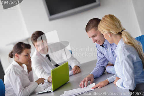 Image of business people in a meeting at office
