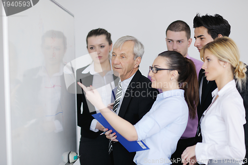 Image of Senior business man giving a presentation