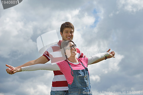 Image of romantic young couple in love together outdoor