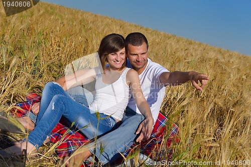 Image of happy couple in wheat field