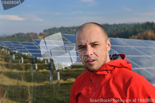 Image of Male solar panel engineer at work place