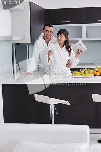 Image of young couple have fun in modern kitchen