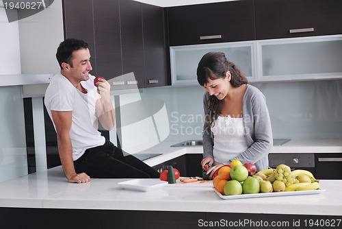 Image of young couple have fun in modern kitchen