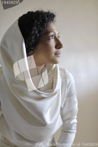 Image of Portrait of a beautiful woman dressed as a bride