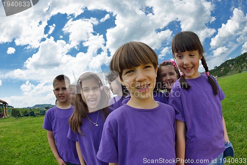 Image of happy kids group  have fun in nature