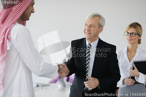 Image of Arabic business man at meeting