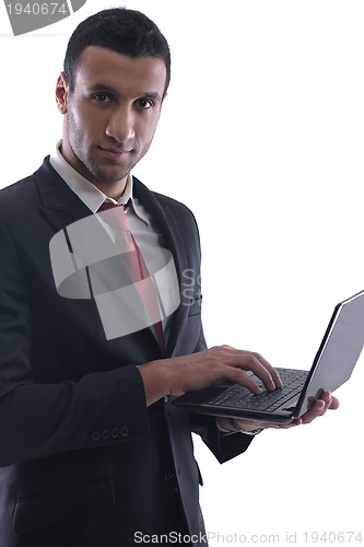 Image of business man work on mini laptop