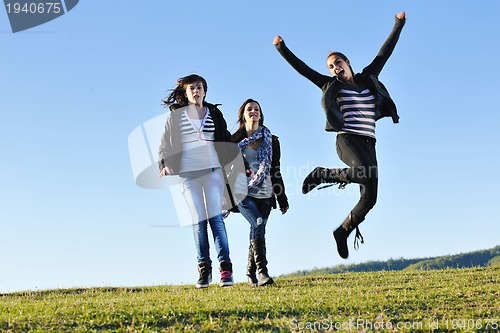 Image of group of teens have fun outdoor