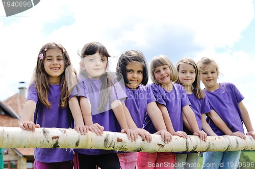 Image of happy kids group  have fun in nature