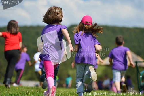 Image of happy kids group  have fun in nature