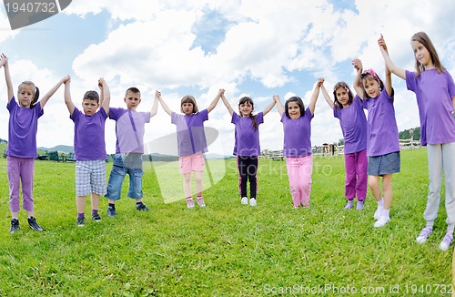 Image of happy kids group  have fun in nature