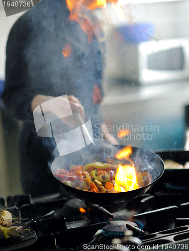 Image of chef preparing meal