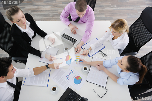 Image of Group of young business people at meeting