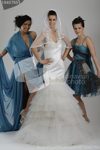 Image of portrait of a three beautiful woman in wedding dress