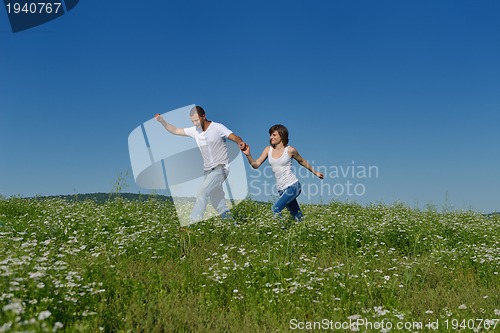 Image of happy couple in wheat field