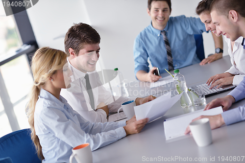 Image of business people in a meeting at office