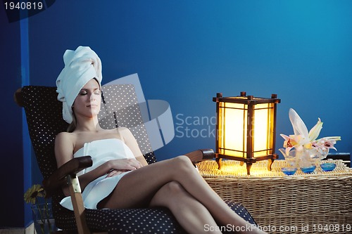 Image of Beautiful young woman in spa