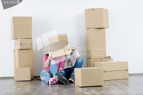 Image of Young couple moving in new house