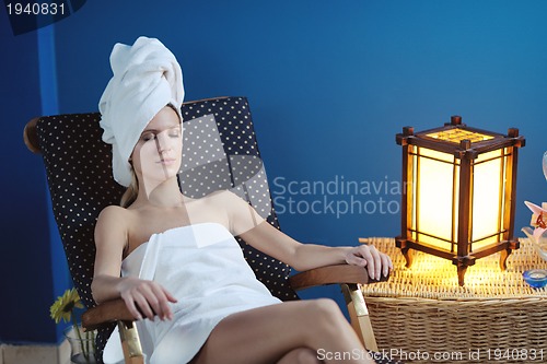 Image of Beautiful young woman in spa
