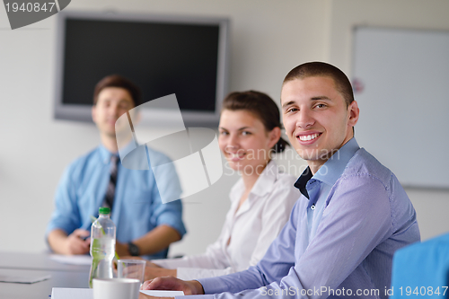 Image of business people in a meeting at office