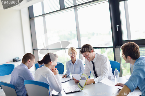 Image of business people in a meeting at office