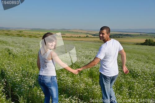 Image of happy couple in wheat field