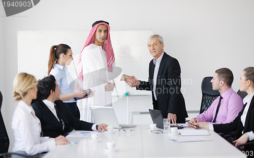 Image of Arabic business man at meeting