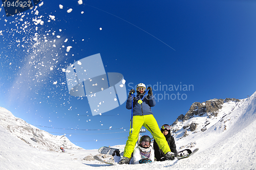 Image of winter portrait of friends at skiing