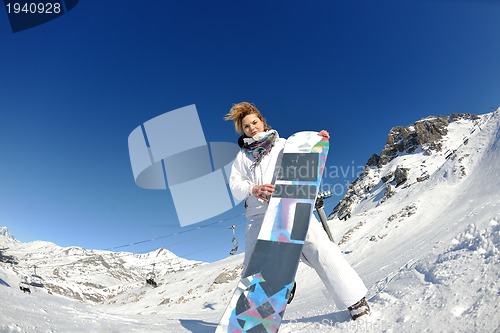 Image of skiing on fresh snow at winter season at beautiful sunny day