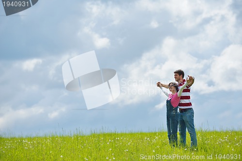 Image of romantic young couple in love together outdoor