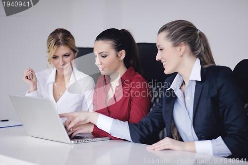 Image of business woman group with headphones