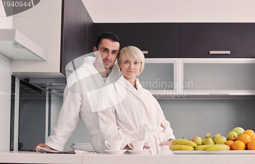 Image of young couple have fun in modern kitchen
