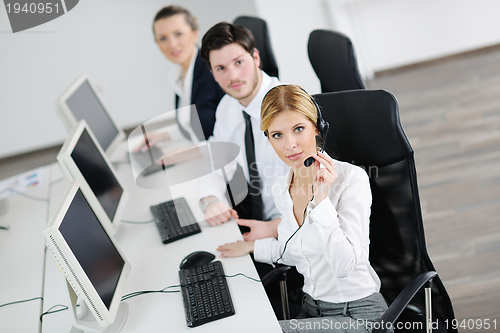 Image of business people group working in customer and help desk office