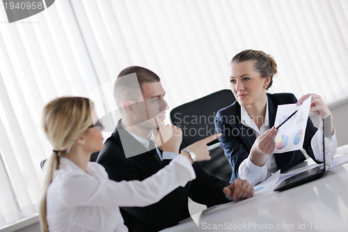 Image of business people in a meeting at office