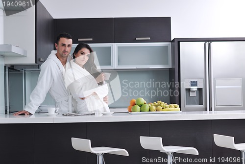 Image of young couple have fun in modern kitchen