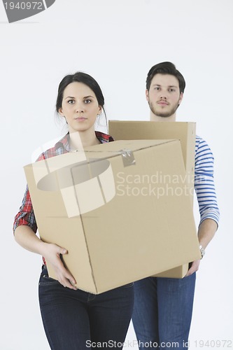 Image of Young couple moving in new home