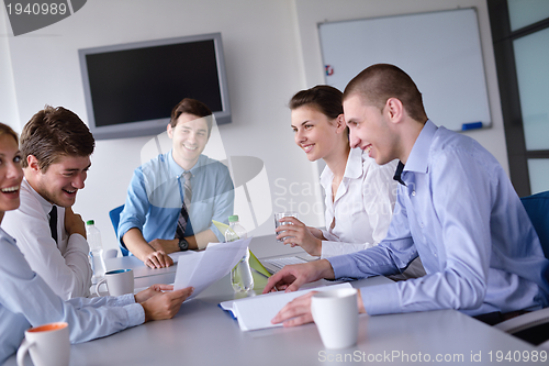 Image of business people in a meeting at office