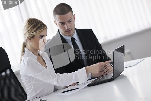 Image of business people in a meeting at office