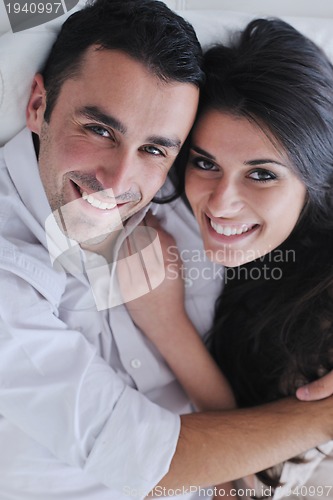 Image of happy young couple relax at home