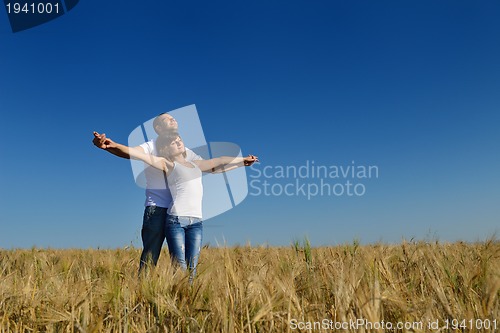 Image of happy couple in wheat field